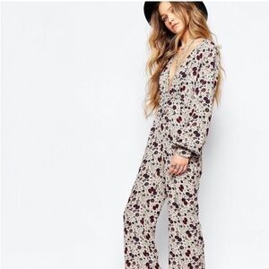 Free People Long sleeve floral romper